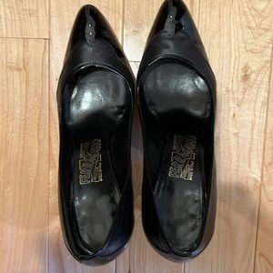 Black leather and patent pumps by ferragamo
